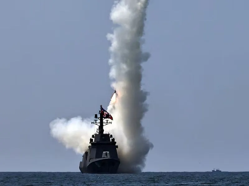 North Korean leader Kim observes weapons tests from new naval destroyer